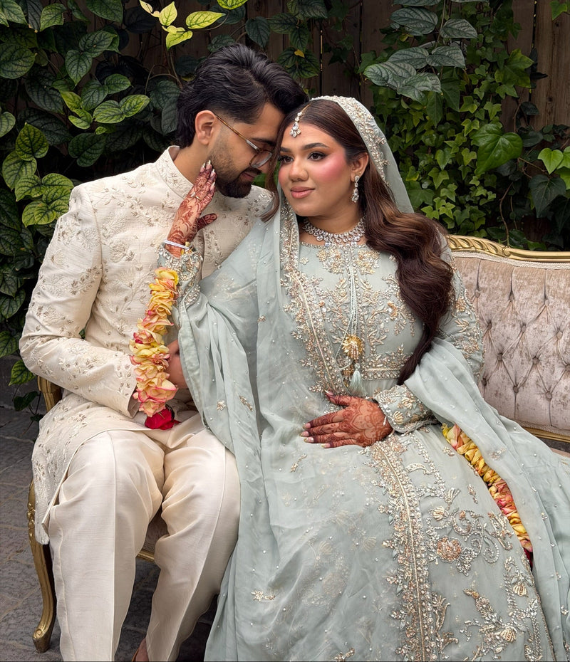 Bride in a pastel ice-blue Nikkah outfit with embroidered veil, by Karigur, the GTA