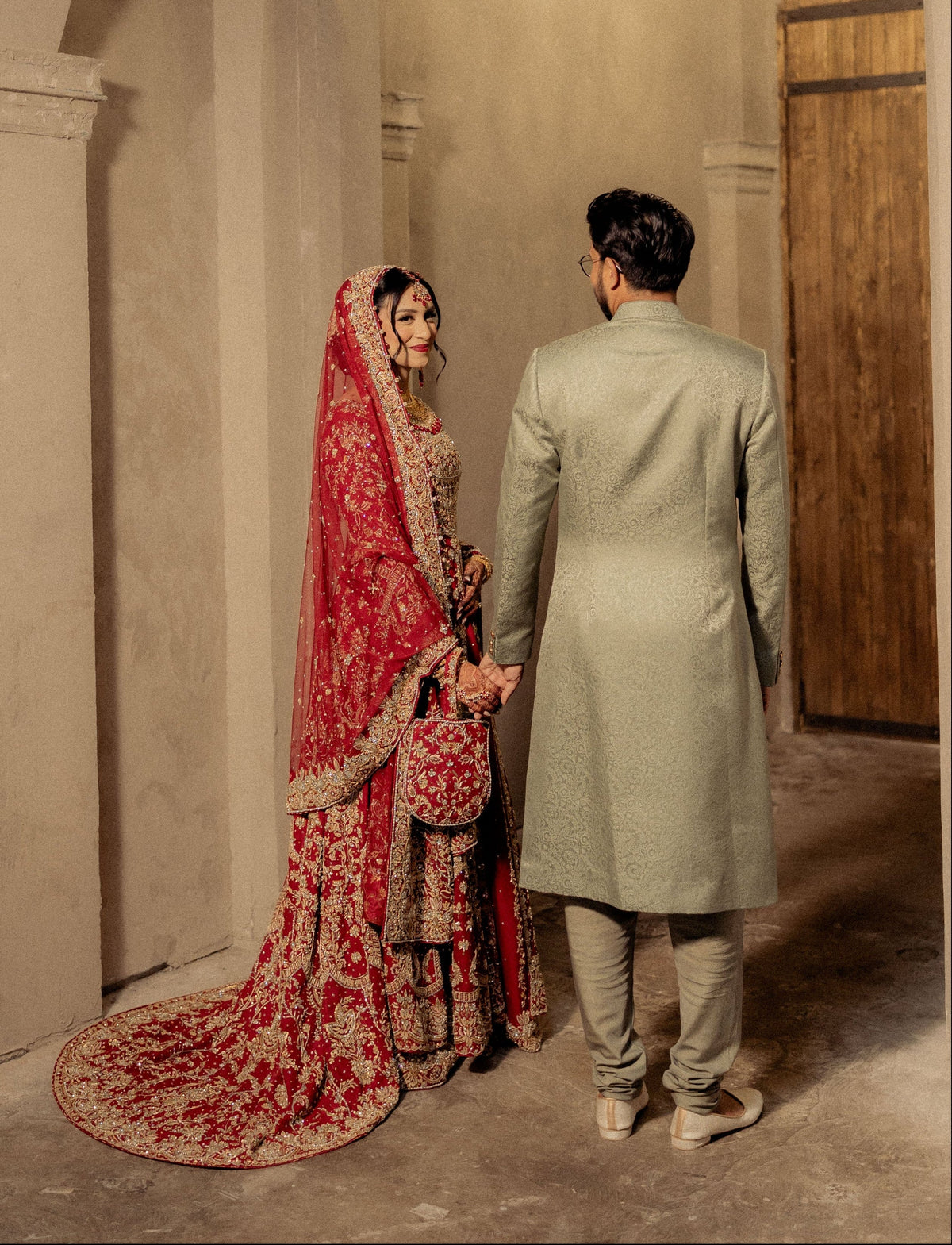 A calm, elegant South Asian bridal boutique interior in the Toronto area: soft daylight, d