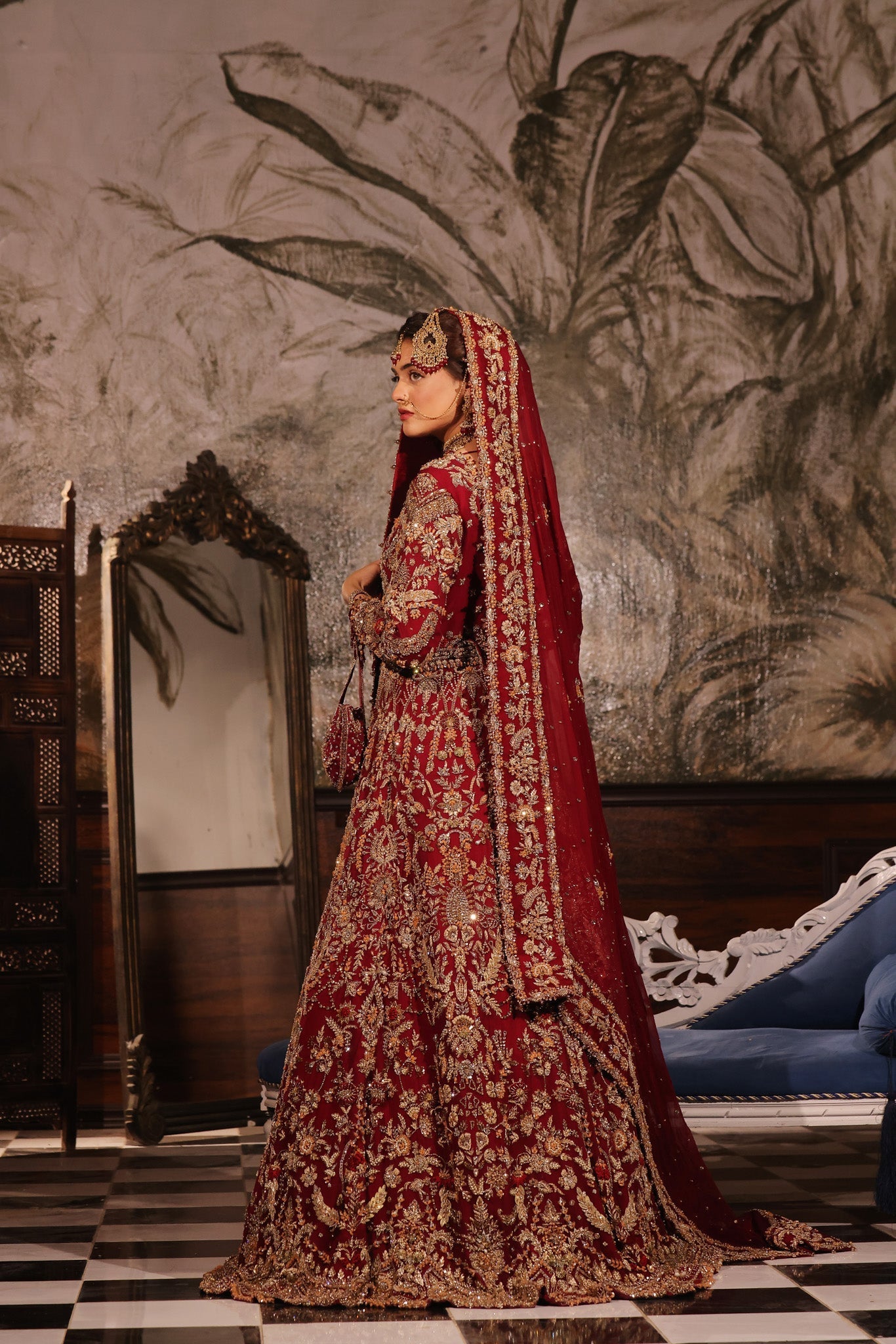 Karigur Ruhani red bridal gown — close detail of gold zardozi, sequin and rhinestone embroidery on the bodice.