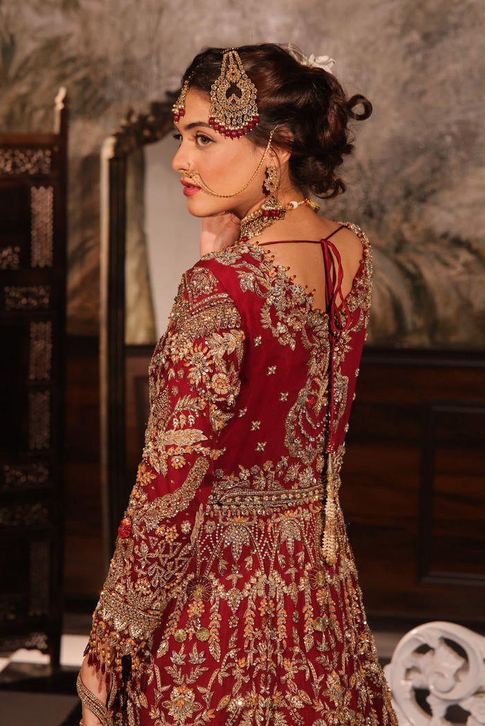 Karigur Ruhani — back view of the red bridal gown showing the embroidered dupatta drape.