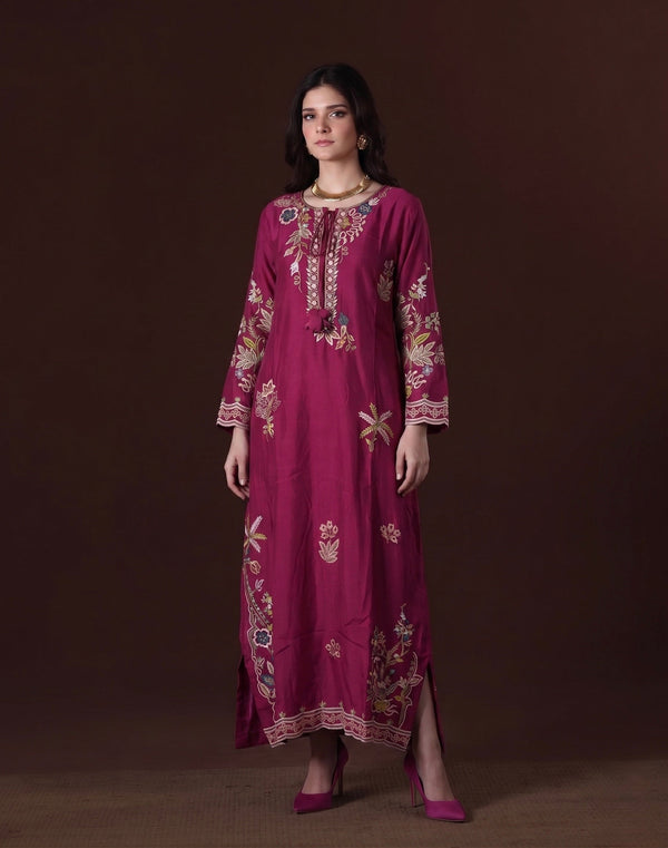 Model in a magenta silk kameez-maxi with multicolour floral embroidery by Karigur Bridal