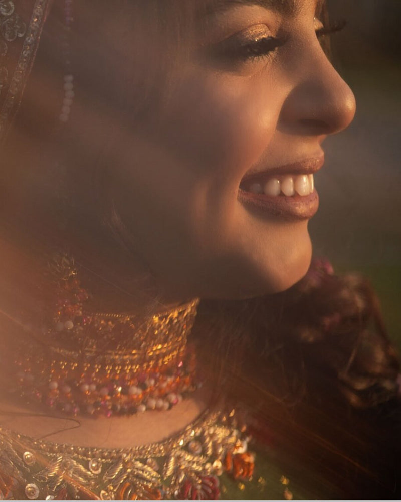 Mehndi bride in green and gold with gota work and hand-set jewellery, by Karigur